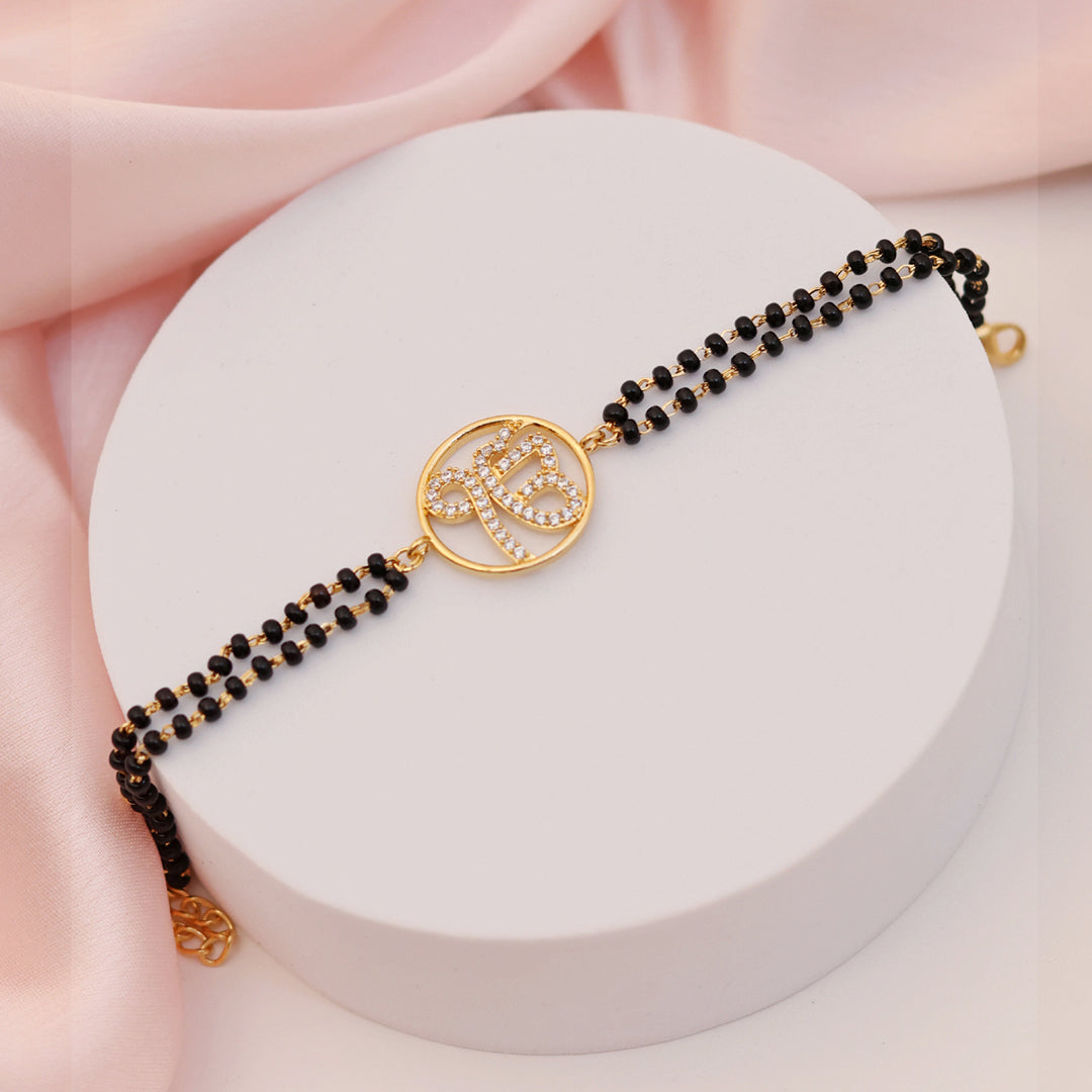 Ek Omkar Black Beads Bracelet