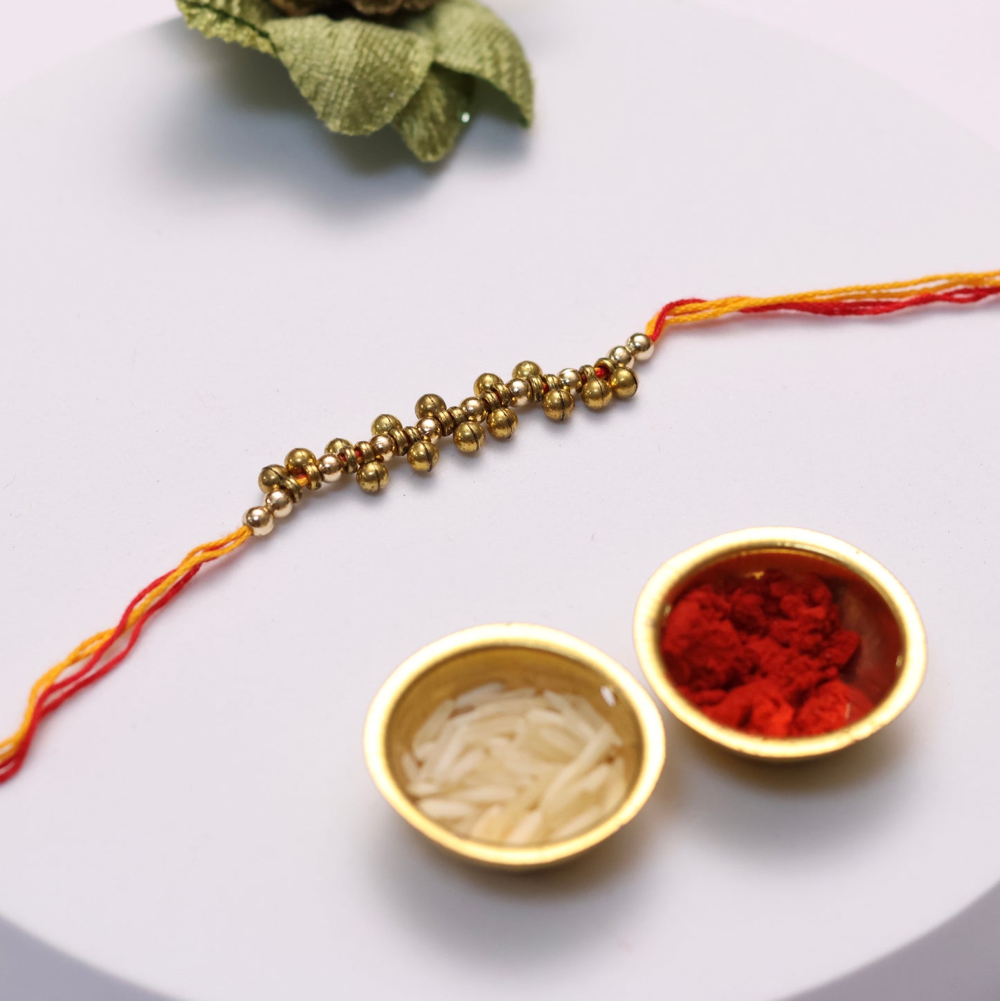 Manjari Gold Beads Mauli Rakhi