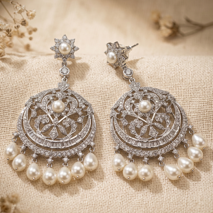 silver with white pearl earring