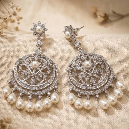 silver with white pearl earring