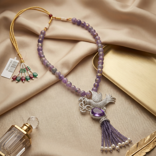 Purple stone with bird necklace