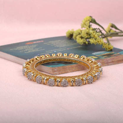 Gold Toned Pacheli Bangle